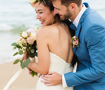 Laughing Couple on Their Wedding Day